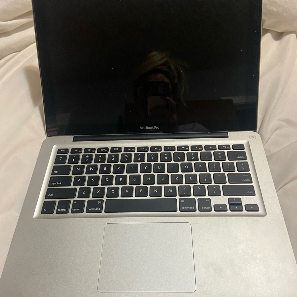 Apple Silver MacBook Pro with Black Keyboard